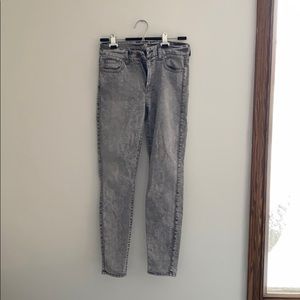 Washed mid rise ankle skinny jeans